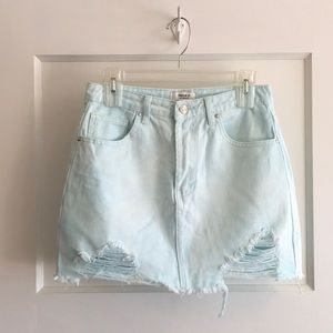 Light blue distressed mini jean skirt; size 27